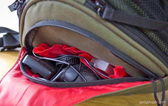 Additional space for DSLR accessories in the front pocket of the Caden K1 camera bag
