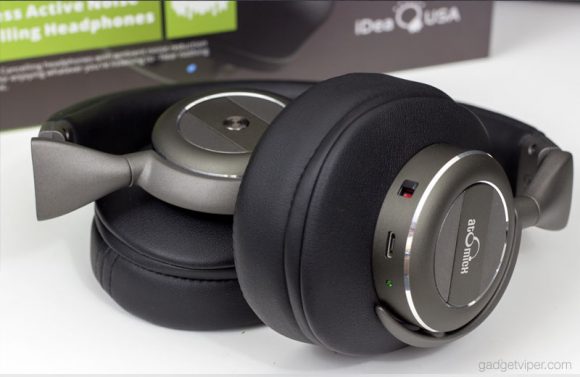 The AtomicX V203 Active noise cancelling wireless headphones folded up for storage
