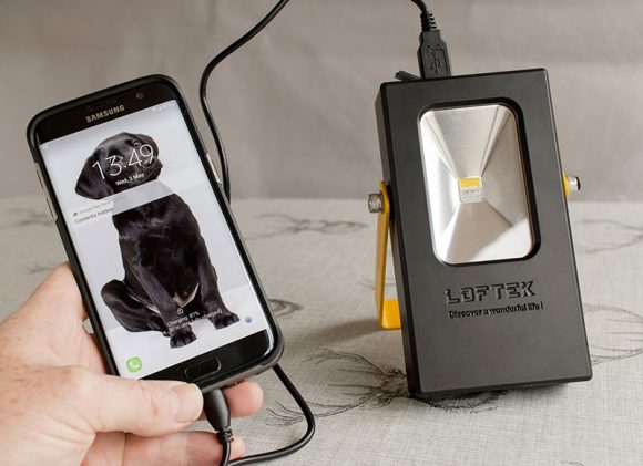 charging my phone with the Loftek portable flood light