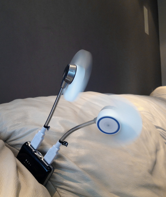 using the Arctic breeze fan with a portable charger while watching TV