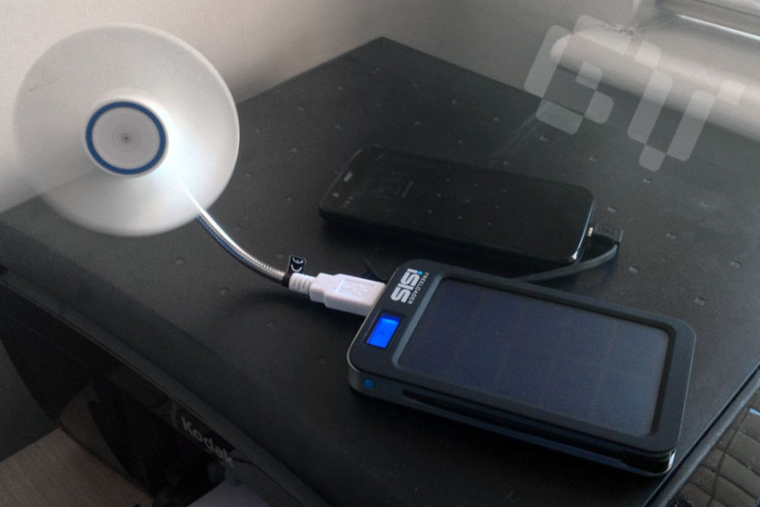 Use a portable phone charger with a USB fan to keep you cool on a hot day