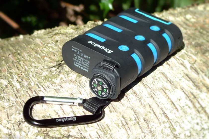 A view of the EasyAcc Waterproof power bank with the attached compass and carabiner.