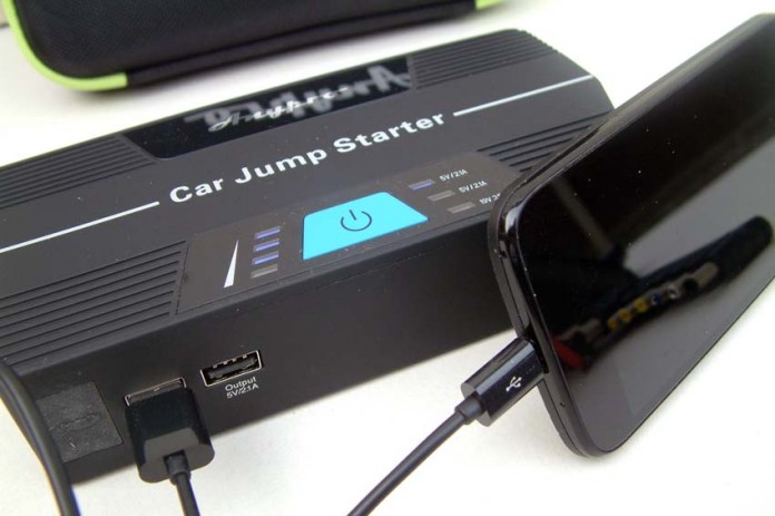 The AnyPro Car Starter used as a portable power bank to charge a smartphone
