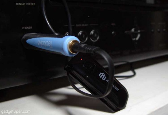 The iClever low latency bluetooth transmitter connected to an AV receiver