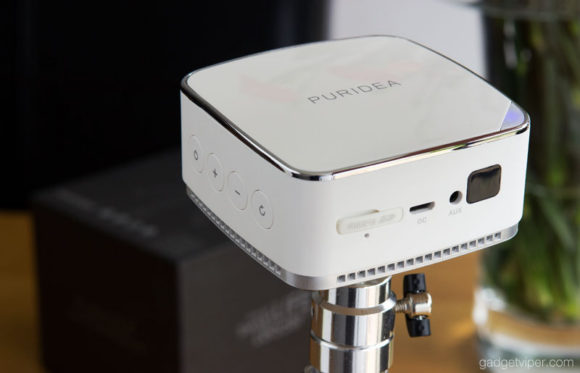 The PURIDEA poertable wireless projector featuring a MicroSd slot and AUX output for audio